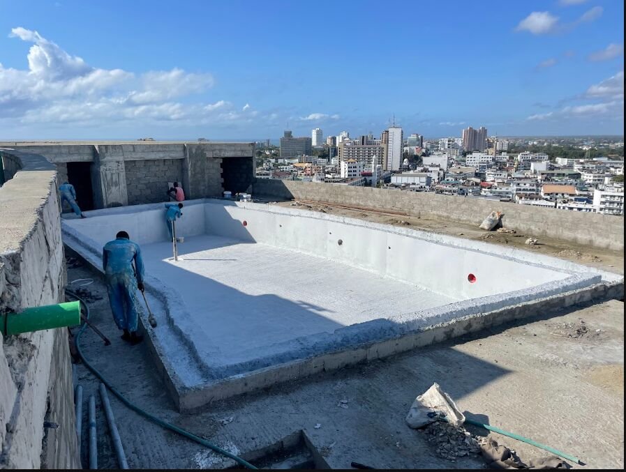 Rooftop swimming pool after waterproofing, fully coated