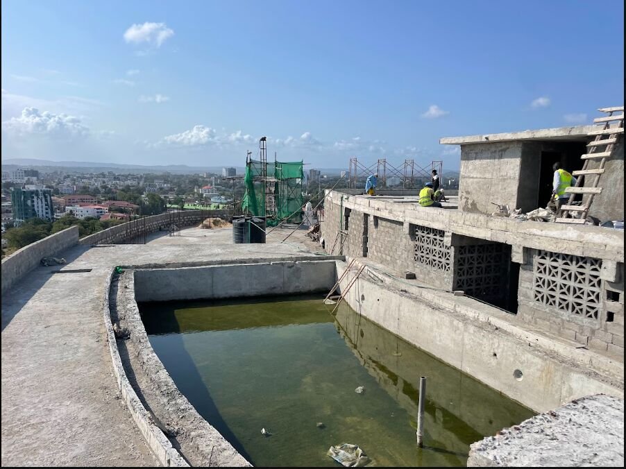 Rooftop swimming pool before waterproofing, bare concrete